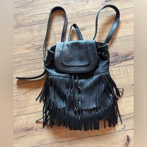 Carlos Santana leather backpack.